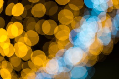 Soyut turuncu ve mavi Bokeh çemberi. Noel arkaplanı