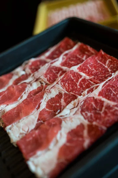 Premium quality sliced beef meat with perfect marbled textured for Sukiyaki and Shabu. Premium rare beef