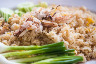 Delicious crab fried rice and green onion. Close up