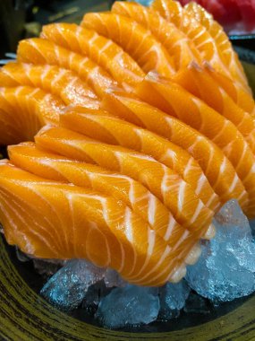 Salmon Sashimi in Japanese buffet restaurant menu. Asian food menu