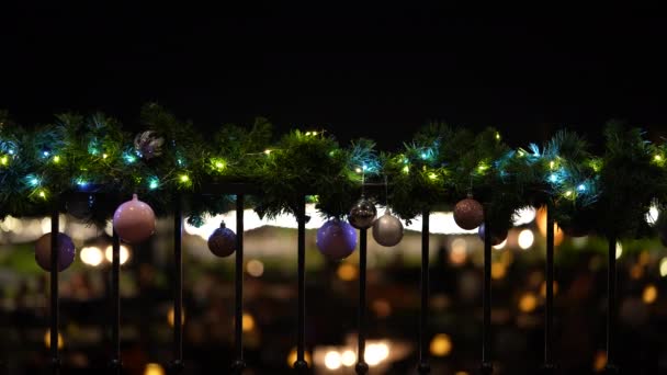 Christmas Decorated Balcony Ball Branch Pine Background Bokeh Flickering Light — Stockvideo