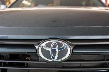 Bangkok, Thailand -  March 4, 2023 : Close up of Toyota logo on all new Toyota YARIS ATIV front view. Urban Metal color.