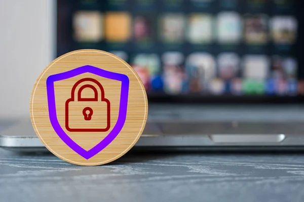 Security icon protection and internet privacy a wood block with icons of the shield with a padlock inside. The concept of cyber security. Cyber security network. Data protection privacy concept
