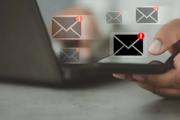 Hand of man using a smartphone for many email with notification alert. Online communication business technology concept. Email, send and receive electronic documents.