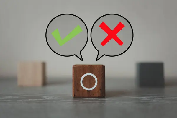 A choice between two way with tick mark and cross mark x on in speech bubble, you can tick on empty circle on wood block in the center. A choice between Yes and No