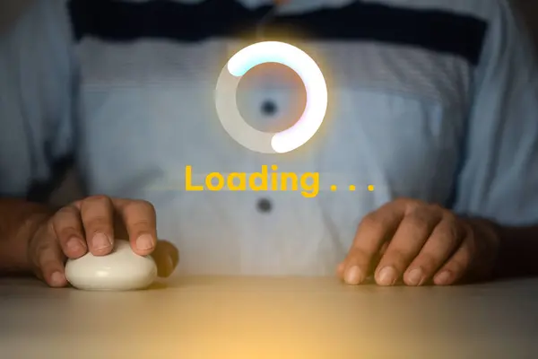 Businessmen using the mouse for loading data applications, show a loading icon waiting on a virtual display. Download digital data website. Virtual loading icon for software program update concept.