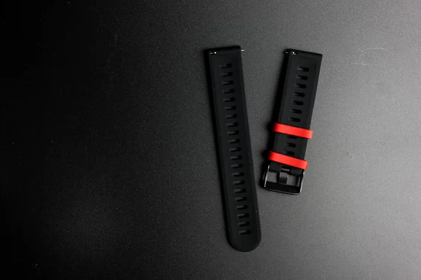 Pieces of black smartwatch watch strap made of silicone