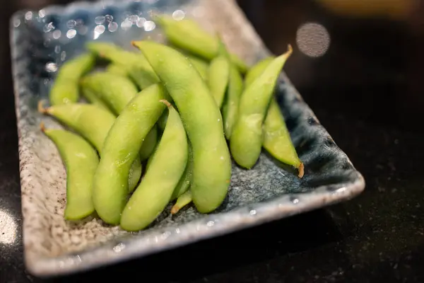 stock image Close up steam edamame beans on dish