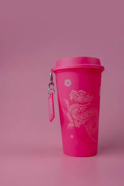 stock image Bangkok, Thailand - June 26, 2024 : A pink reusable cup from Cafe Amazon, Get power to enhance your luck with cup name of Dragon pattern. Get 1 free Dragon Reusable Cup in June 25, 2024