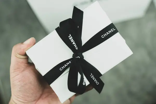 stock image Bangkok, Thailand - August 28, 2024 : Chanel gift with proper packaging showing the brand on the ribbon. Perfect for Valentine day or Christmas.