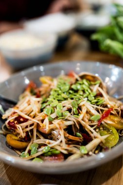 Papaya salad with crab and fermented fish decoration seed Acacia, a popular food among Thai people clipart