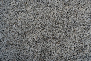 Küçük taş dokusu, arka plan için beyaz taş duvar, bahçe dekorasyonu için çakıl taşı.