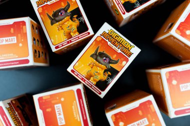 Bangkok, Tayland - 30 Nisan 2025: Top view a box toy Digimon Adventure Adventure Magnet Figures from pop mart shop.