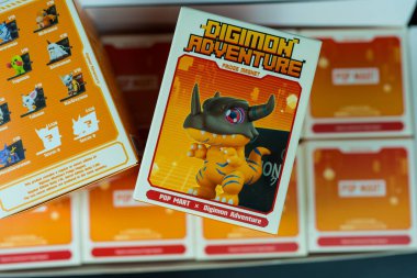Bangkok, Tayland - 30 Nisan 2025: Top view a box toy Digimon Adventure Adventure Magnet Figures from pop mart shop.