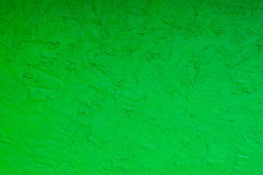 Doku tasarımı için yeşil çimento duvar arka planı. Pastel yeşil beton taş dokusu