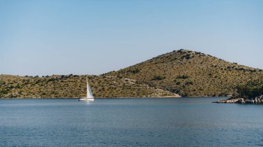 Summer nautical yacht adventure off coast of Dugi Otok island in Adriatic Sea, Croatia clipart