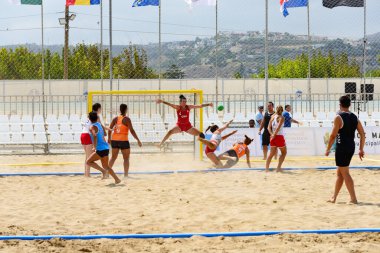 Heraklion, Crete, Greece, 9 September 2023. 3rd Mediterranean Beach Games at Karteros Beach Sports Center. Beach Handball players during the 2023 International Mediterranean Beach Games championships clipart
