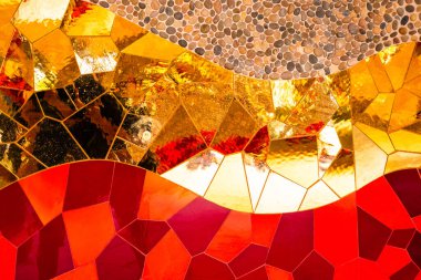 Abstract multicolored wall art glass crystals, pebbles stones mosaic elements decoration. Detail of red, orange, yellow, gold, glass silver color waves of ornamental abstract mosaic art patterns clipart