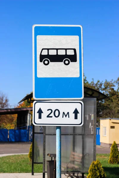 International road signs \'Bus stop\' after 20 meters