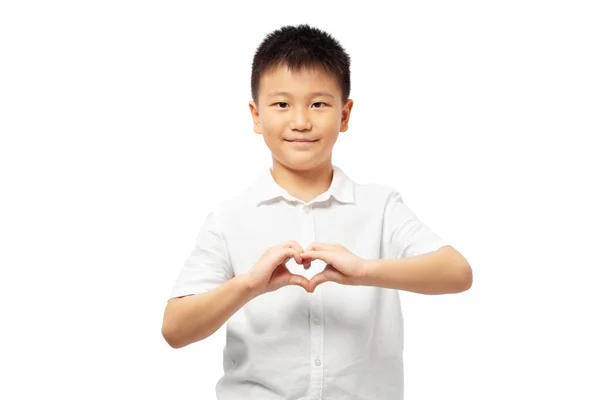 Dziecko Ręką Pokazując Znak Serca Noszenie Białej Koszuli Izolowane Białym — Zdjęcie stockowe