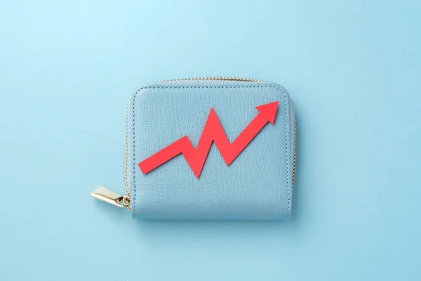 Gráfico Rojo Subiendo Cartera Sobre Fondo Azul Vista Superior — Foto de Stock