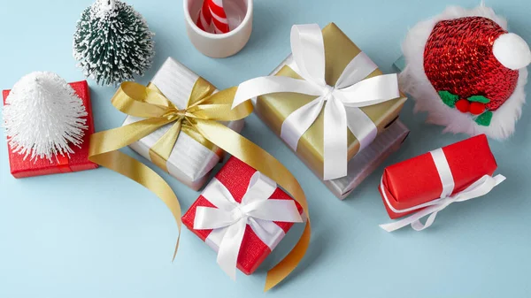 Christmas Gift Gold White Ribbon Decoration Light Blue Background Top — Stock Photo, Image