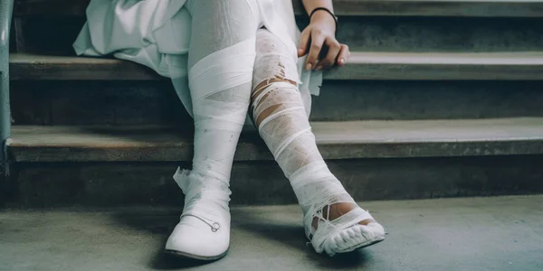Female patient with broken leg