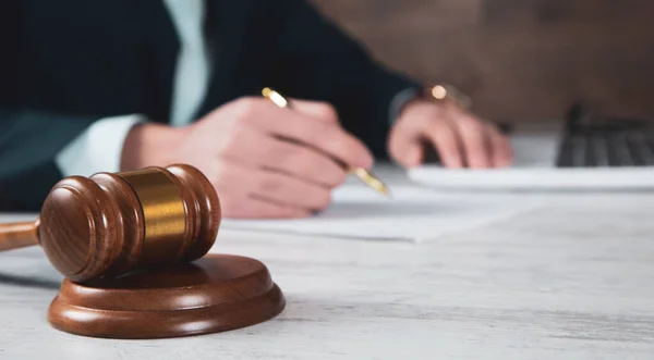 stock image judge with man working in computer on desk