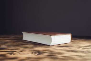 book on the wooden table background