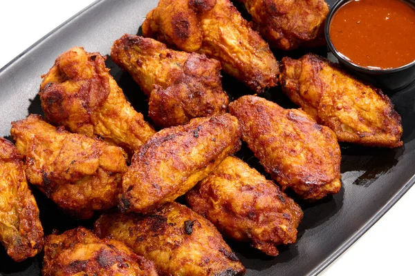 stock image plate with barbecue chicken wings