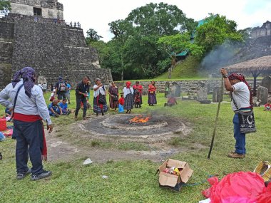 Mayan Ritual in Front of Temple I Tikal, Peten, Guatemala clipart