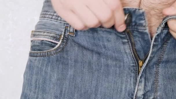 Man Puts Condom Front Pocket His Jeans Close — Vídeo de Stock