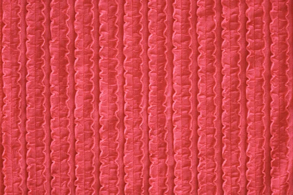 Pink wool seamless knitted texture background. Pattern of shawl knitting. Up close