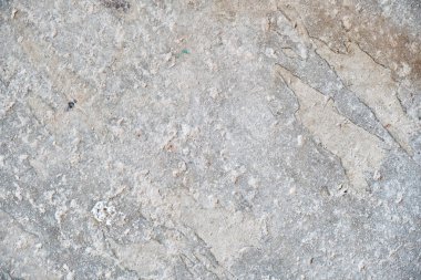 Arka plan için eski, lekeli gri beton duvar dokusu.