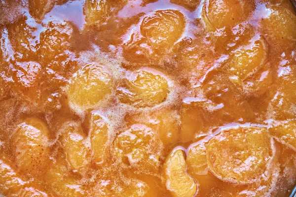 Kayısı reçelinin doğal dokusu. Ev yapımı hazırlıklar. Yukarıdan görüntüle.