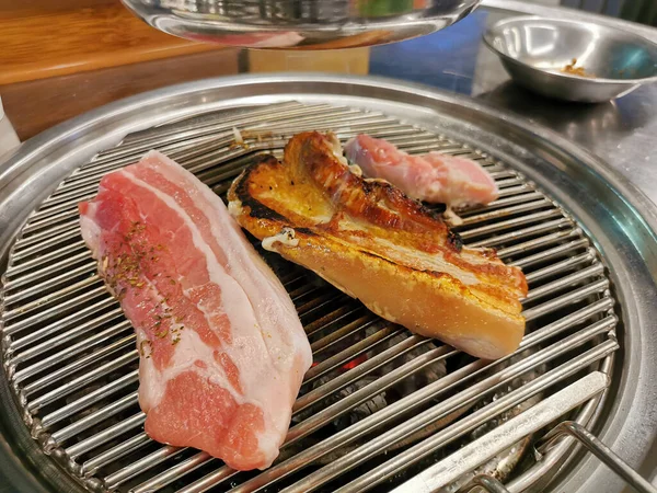 Delicious pork BBQ Pork belly grilled for big dinner meal in Seoul, South Korea