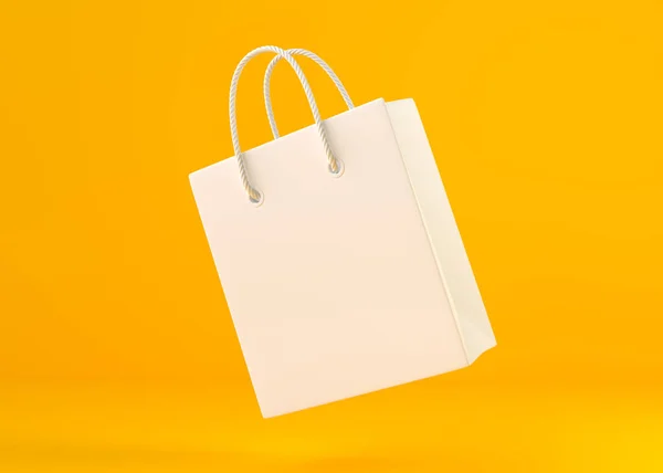 Empty White Color Shopping Bag Flying Yellow Background Copy Space — Stock Photo, Image