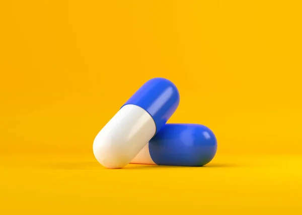 黄色の背景を持つ2つの青白の錠剤カプセル 医薬品または医薬品のコンセプト 3Dレンダリングイラスト — ストック写真