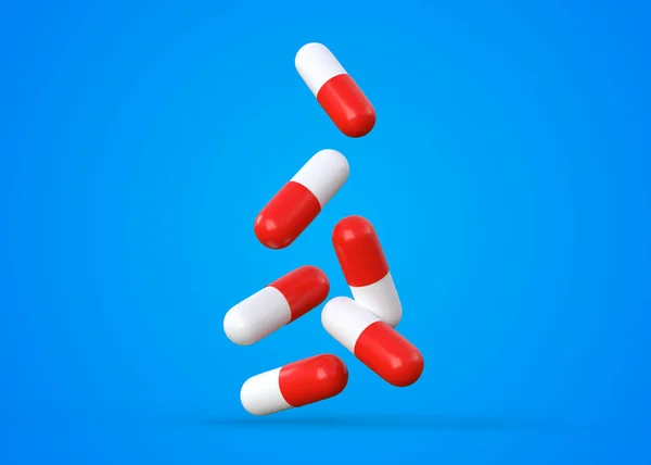 Medicina Farmacêutica Pílulas Comprimidos Cápsulas Caindo Sobre Fundo Azul Conceito — Fotografia de Stock