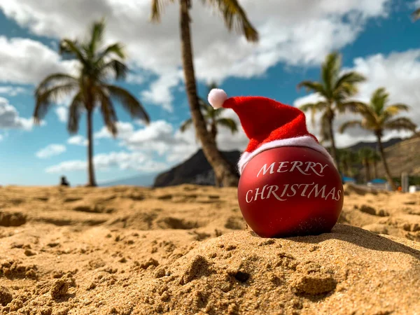 Christmas Bomb Santa Hat Text Merry Christmas Beach Lying Sand — Stock Photo, Image