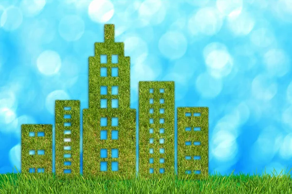 stock image Ecology concept, green city. Green grass textured city shape