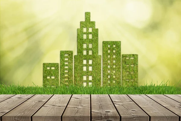 Ecology concept, green city. Green grass textured city shape
