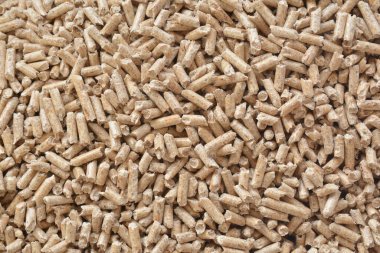 Kahverengi ahşap tanecikleri yakın çekim. Ekoloji kavramı: alternatif enerji