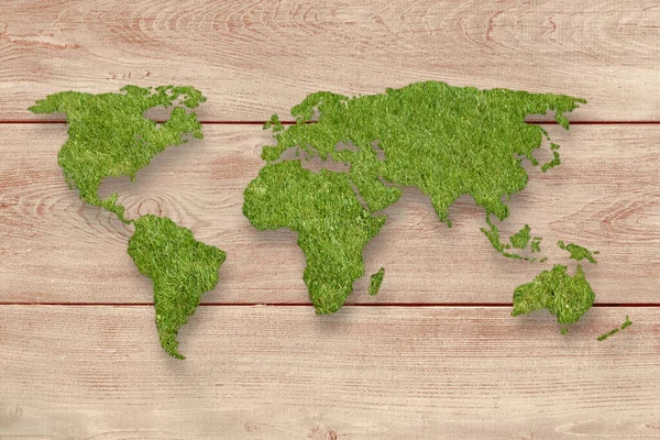 Παγκόσμιος Χάρτης Πράσινο Γρασίδι Ξύλινο Φόντο — Φωτογραφία Αρχείου