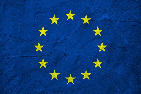 石墙背景上的欧洲联盟旗帜 — 图库照片