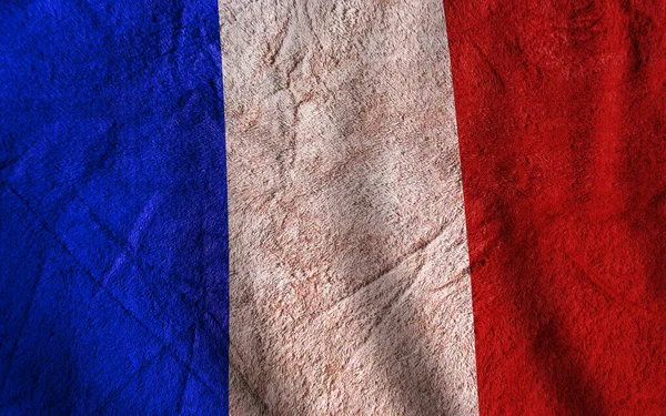 コンクリート壁の背景にフランスの旗 — ストック写真