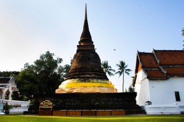 Eski bir stupa ya da eski bir harabe olan Wat Traphang Çadırı Tayland halkı için yabancı gezginler, Tayland, Sukhothai 'deki Sukhothai Tarih Parkı' nda kutsal Buda emanetlerine saygılarını sunarak seyahat ederler.
