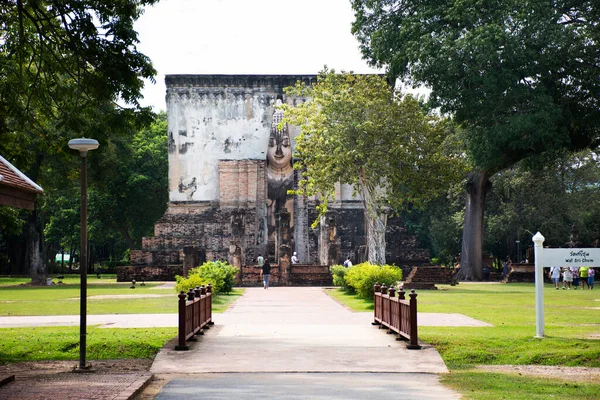 stock image View landscape garden park and ancient ruins building of Wat Si Chum temple and antique buddha statues for thai people and foreign travelers travel visit on October at 28, 2022 in Sukhothai, Thailand