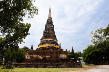 Antik stupa ya da antik harabeler Tayland 'da seyahat eden insanlar için. Buda' nın kutsal emanetlerine hürmet edin. Phra Nakhon Si Ayutthaya, Tayland 'daki Wat Dusitaram Tapınağı' nda kutsal mitler dileyin.