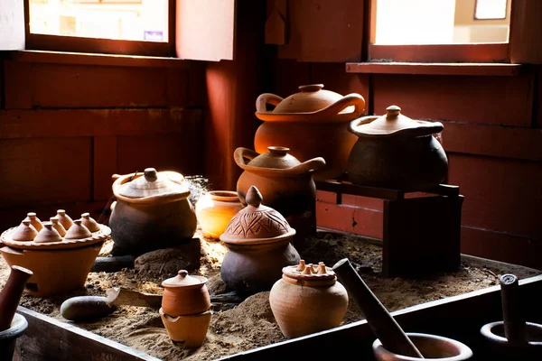 Interior Kitchen room of ancient wooden house or antique wood home in Khum Khun Phaen garden park in Wat Khae temple for thai people foreign traveler travel visit at Suphanburi in Suphan Buri Thailand
